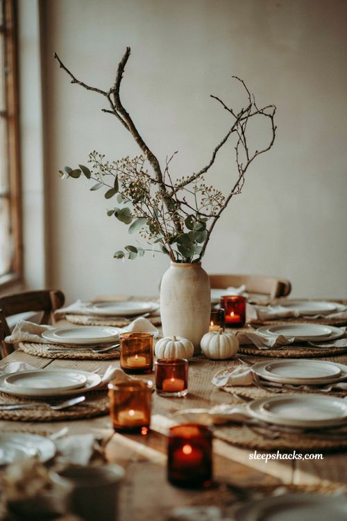 Thanksgiving flower arrangement ideas with neutral berry branches and eucalyptus 
