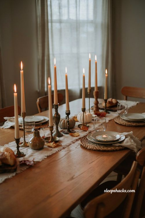Thanksgiving tablescapes with staggered taper candles and vintage holders 