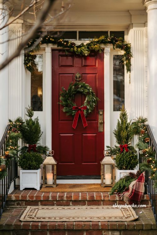 Traditional christmas porch decor with classic holiday doormat and evergreen entry styling