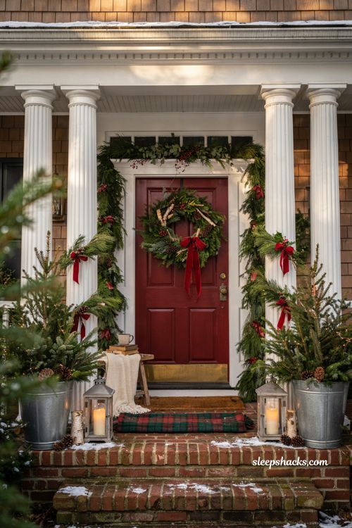 Traditional christmas porch decor with fresh evergreen greenery and classic holiday entry styling