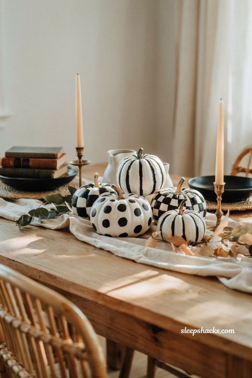 Unique pumpkin decorating ideas with black and white graphic pumpkins for modern fall decor