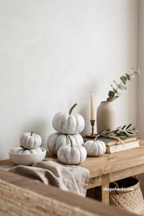 Unique pumpkin decorating ideas with speckled marble pumpkins for elegant fall home decor