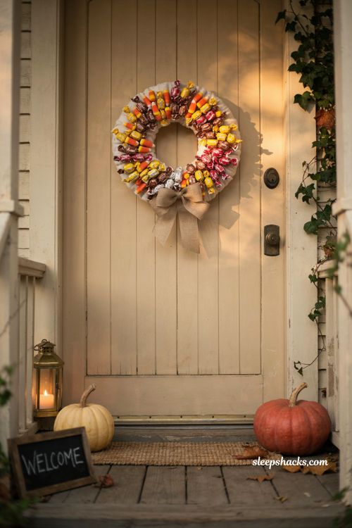 Vintage candy Halloween wreath with burlap bow and autumn front door decor