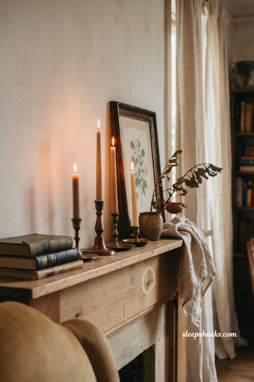Vintage fall decor with aged brass and copper candleholders