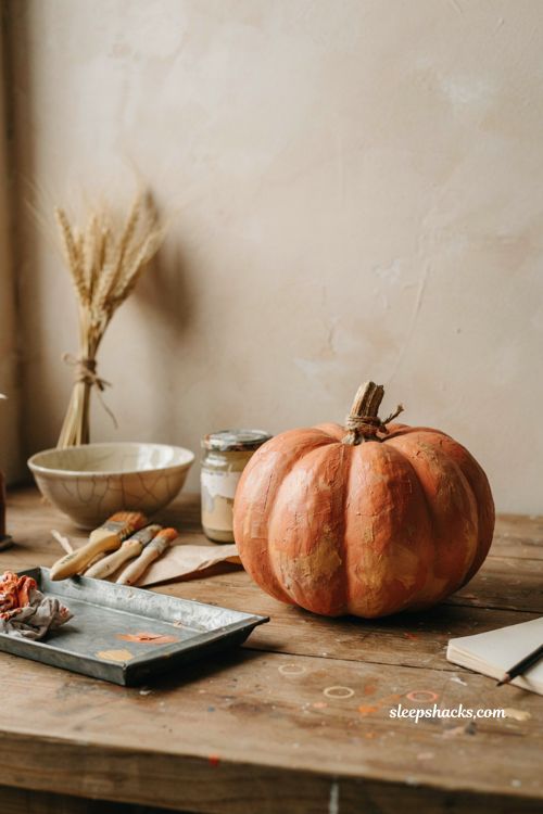 Vintage paper mache pumpkin decor made from a plastic pumpkin 