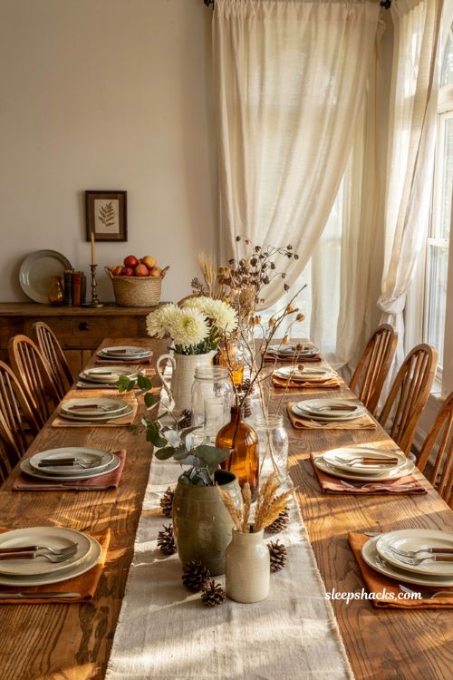 Vintage pitcher and mason jar autumn centerpiece ideas for a cozy farmhouse table