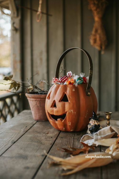 Vintage pumpkin candy bucket with retro jack o lantern face