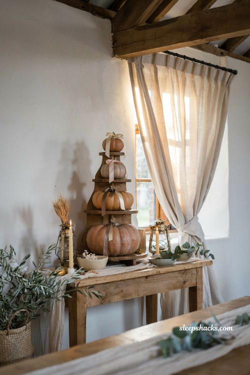 White pumpkin wedding favor table with elegant autumn exit display