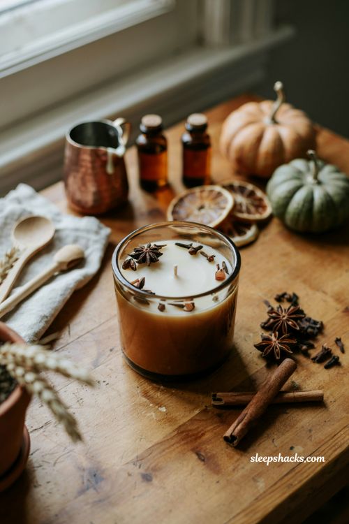 Whole spice topped candle with star anise cloves and cinnamon for fall