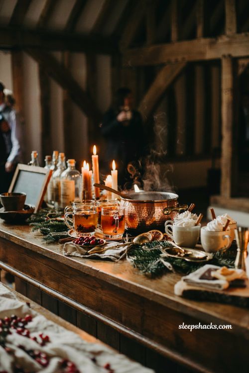 Winter wedding bar ideas with mulled wine hot toddy cranberry and cozy candlelight