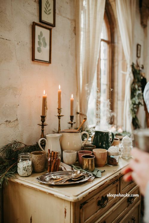 Winter wedding hot chocolate bar ideas with vintage mugs pine and cozy toppings