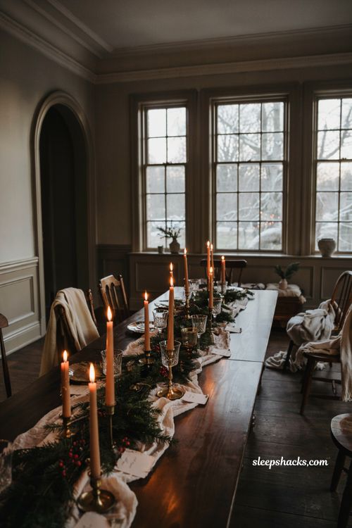 Winter wedding ideas with candlelight pine branches and cozy jewel tone reception decor
