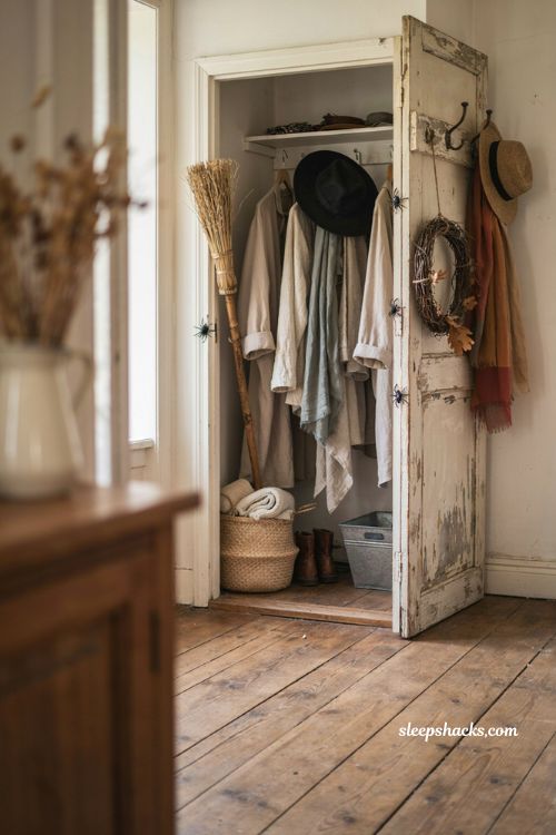 Witch closet surprise with a broom and black hat for farmhouse Halloween decor 