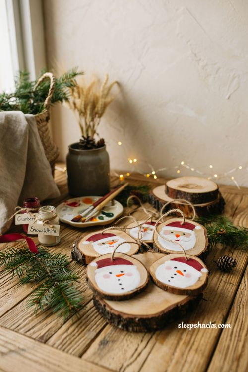 Wood slice Santa and snowman Christmas ornaments with natural wood grain