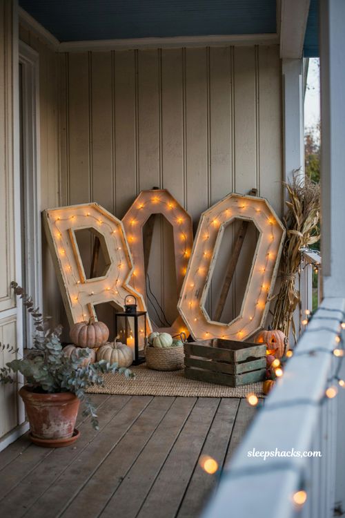 Wooden boo marquee letters with orange lights for cozy DIY Halloween porch decor