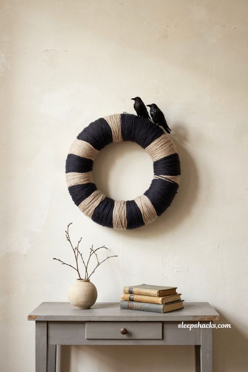 Yarn raven wreath with black and cream yarn minimalist Halloween decor 