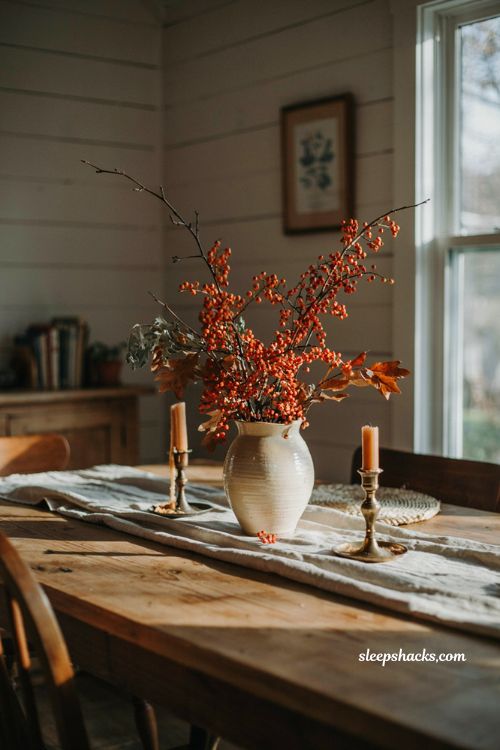 bittersweet branch fall centerpiece ideas with rustic autumn berries and natural table decor