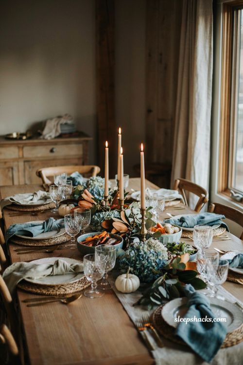 blue and green Thanksgiving table with velvet napkins eucalyptus hydrangeas and brass