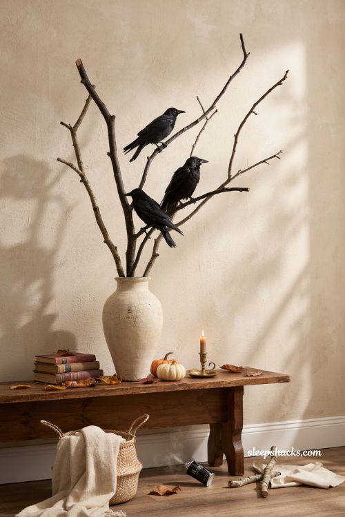 cheap diy black painted branches with crows for halloween decor