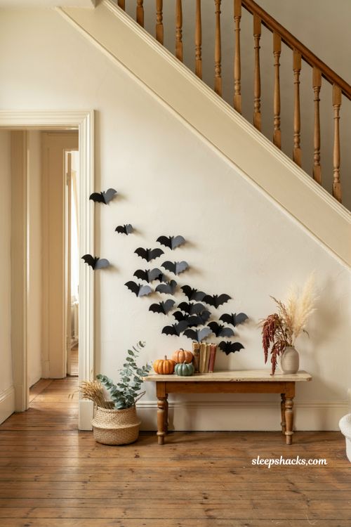 cute halloween decor with playful black bat silhouettes on a light wall