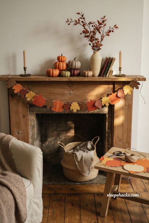 easy diy paper pumpkin garland for a cozy halloween mantel