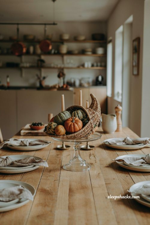 id="90542" elevated cornucopia on glass cake stand with pumpkins and gourds Thanksgiving centerpiece