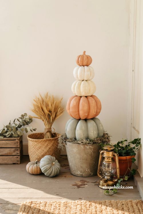 foam pumpkin topiary with moss for elegant dollar tree fall porch decor