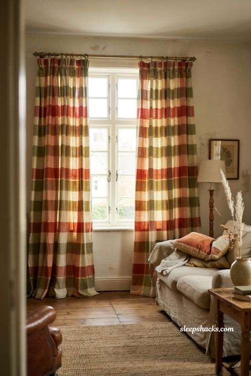repurposed tablecloth curtains in warm rust plaid for cozy fall living room decor