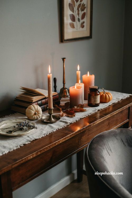 ```text Halloween candle decor with warm pumpkin taper candle, vintage amber jar candle, cozy autumn living room, rustic wooden console, antique brass holders, soft ivory candles, dried leaves, miniature pumpkins, aged textures, subtle gothic cottage style, warm amber candlelight, nostalgic seasonal atmosphere, photorealistic interior photography, Pinterest-worthy ``` 