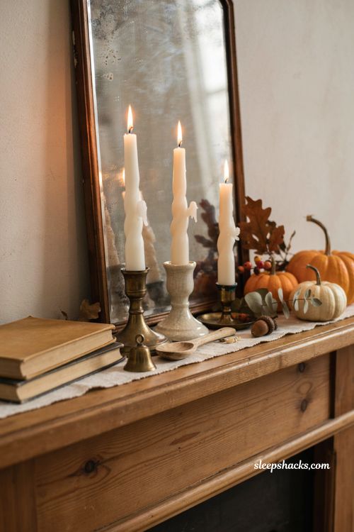 ```text id="q6r2tn" Ghost taper candles in warm ivory wax arranged at different heights on vintage brass and ceramic candlesticks, cozy autumn mantel, miniature pumpkins, dried foliage, weathered wooden surfaces, old books, linen accents, soft natural window light, gentle candle glow, whimsical Halloween decor, nostalgic cottage interior, charming spooky atmosphere, photorealistic editorial interior photography, Pinterest-worthy ``` 