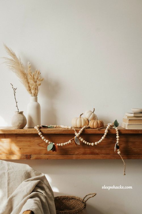 wood bead garland with leaf charms for modern fall decor ideas