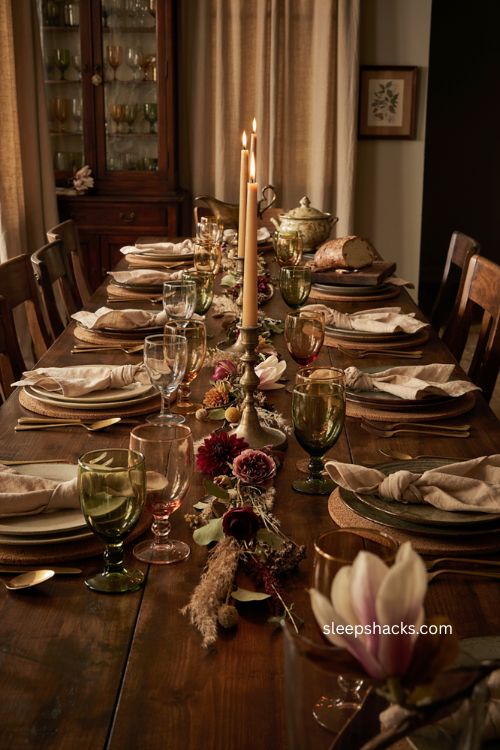Amber glassware Thanksgiving tablescape with vintage goblets candlelight green glass and moody fall decor 