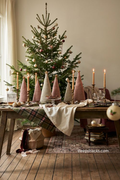 Anthropologie Christmas decor with whimsical ornaments tartan linens and knitted trees