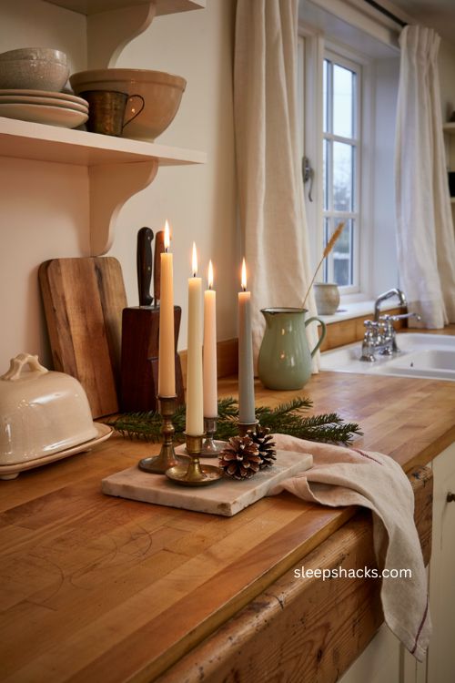 Antique taper candles for warm Christmas kitchen counter decor 