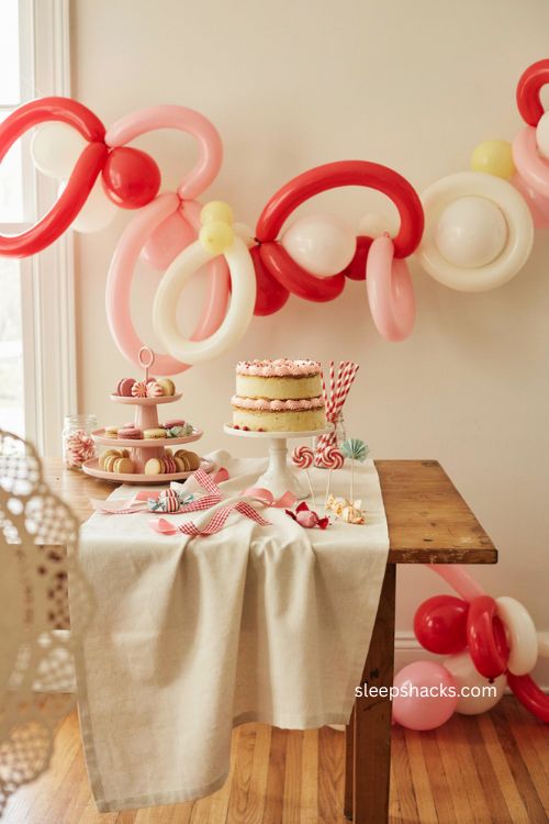 Balloon garland candy swirls for a diy party backdrop 