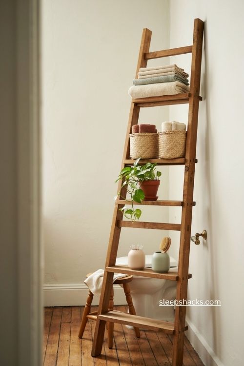 Bathroom ladder shelf storage over toilet with towels baskets and vertical space 