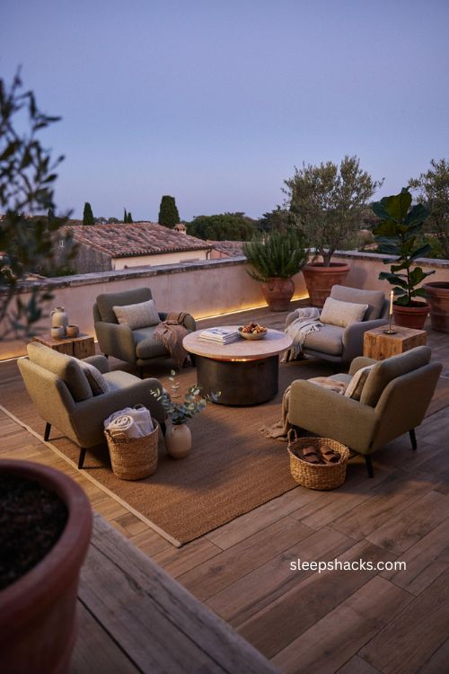 Big balcony ideas with fire pit coffee table cover cozy seating and warm evening ambiance 