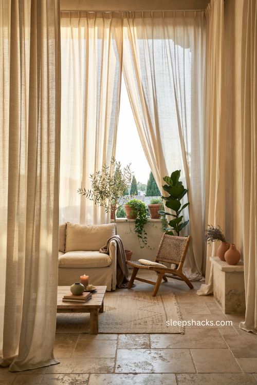 Big balcony ideas with sheer drapes textured curtains privacy and cozy outdoor seating 