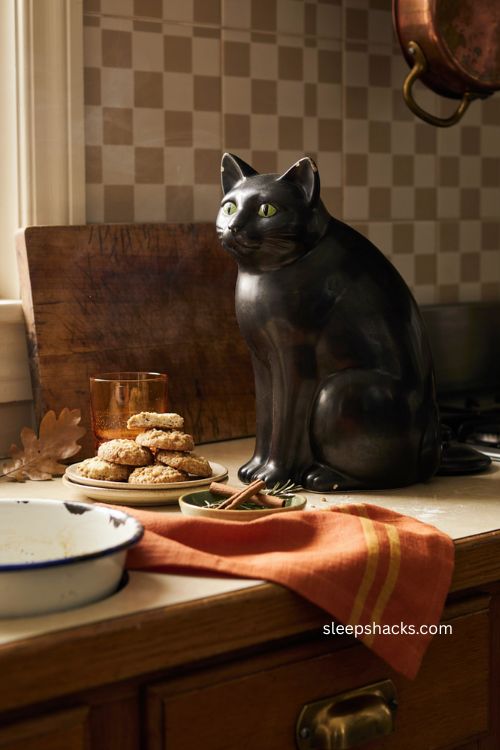 Black cat cookie jar for cozy vintage Halloween kitchen decor 