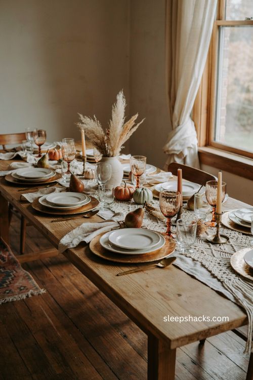 Boho thanksgiving table with earthy neutrals natural textures and organic centerpiece