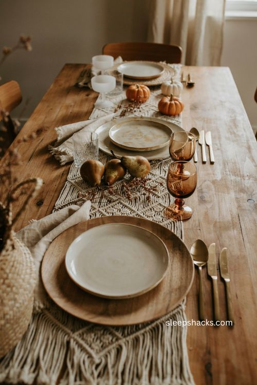 Boho thanksgiving table with wooden gold and rattan chargers
