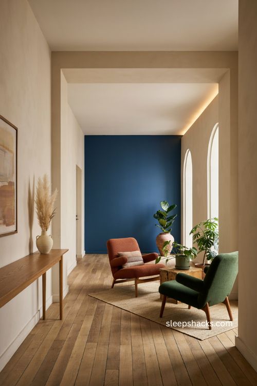 Bold color accents in modern corporate office with vibrant wall and colorful furniture