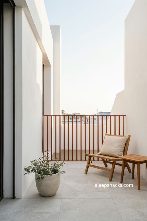 Bold color modern balcony ideas with a terracotta railing and natural wood