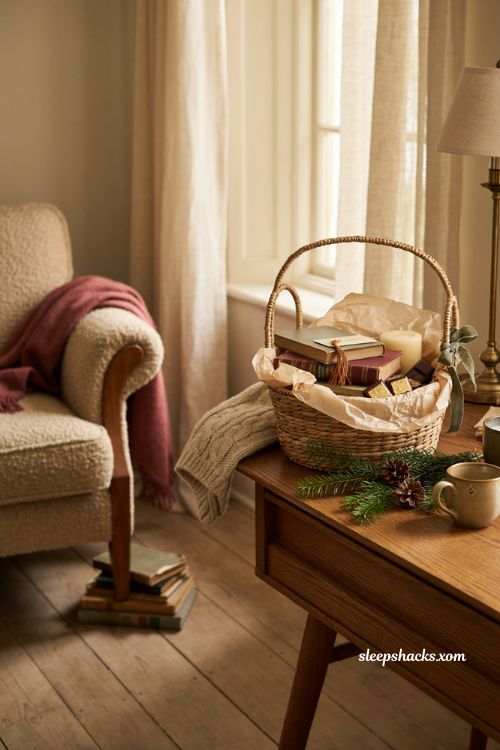 Book lovers Christmas gift basket ideas with books blanket candle and bookmarks 