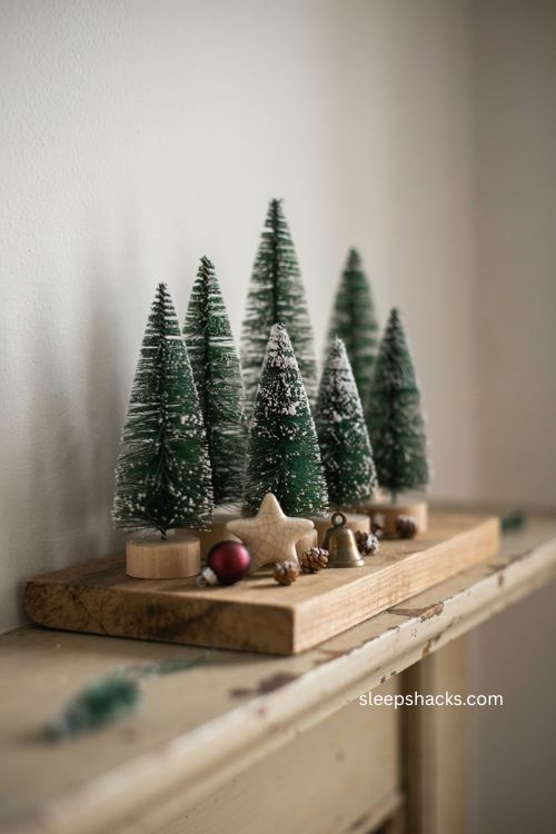 Bottle brush Christmas tree forest mantel decor with snow frosted trees