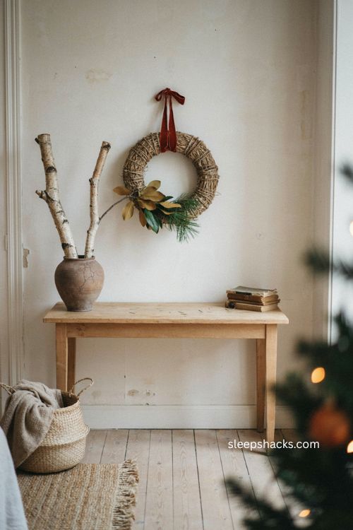 Christmas living room corner with woven wreath magnolia pine and simple cozy decor