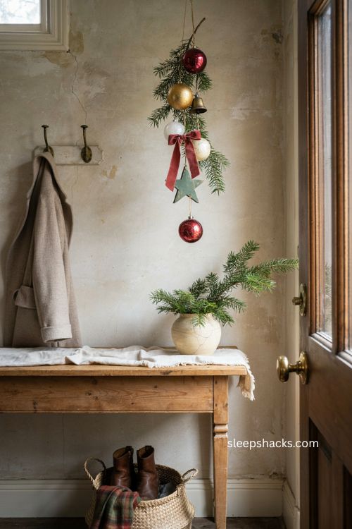 Christmas ornaments clustered above entryway 