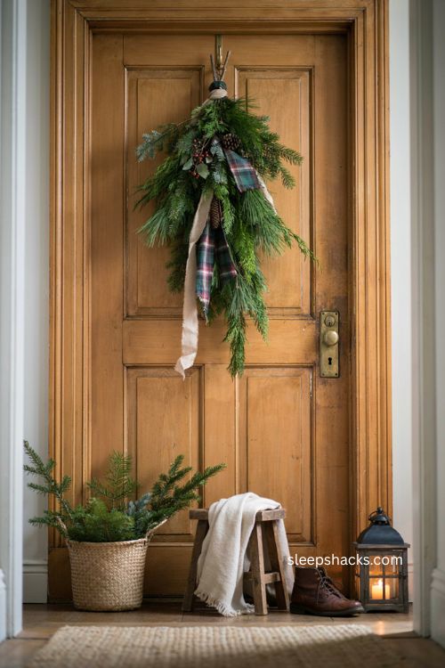 Christmas swags ideas DIY with pine greenery burlap plaid ribbon and pinecones