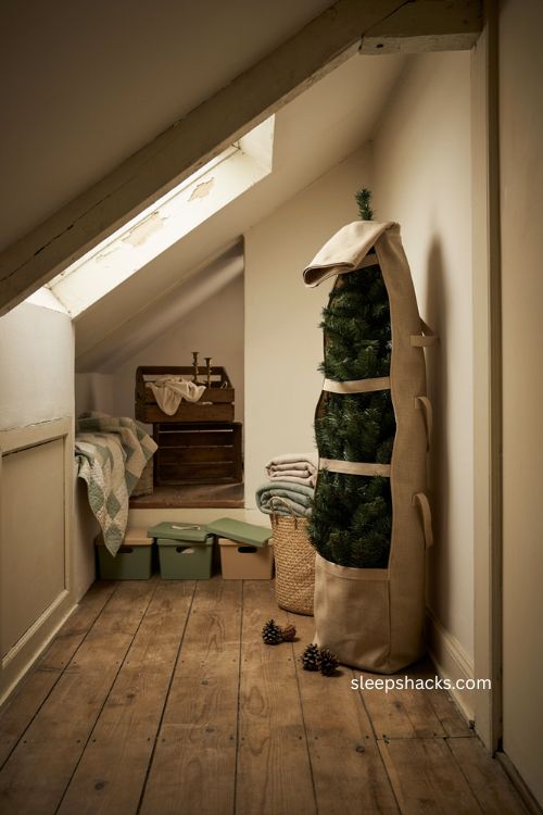 Compression strap Christmas tree storage ideas for small spaces 