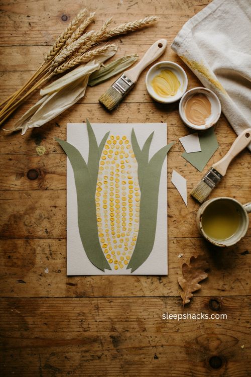 Corn handprint art craft with yellow paint for Thanksgiving 
